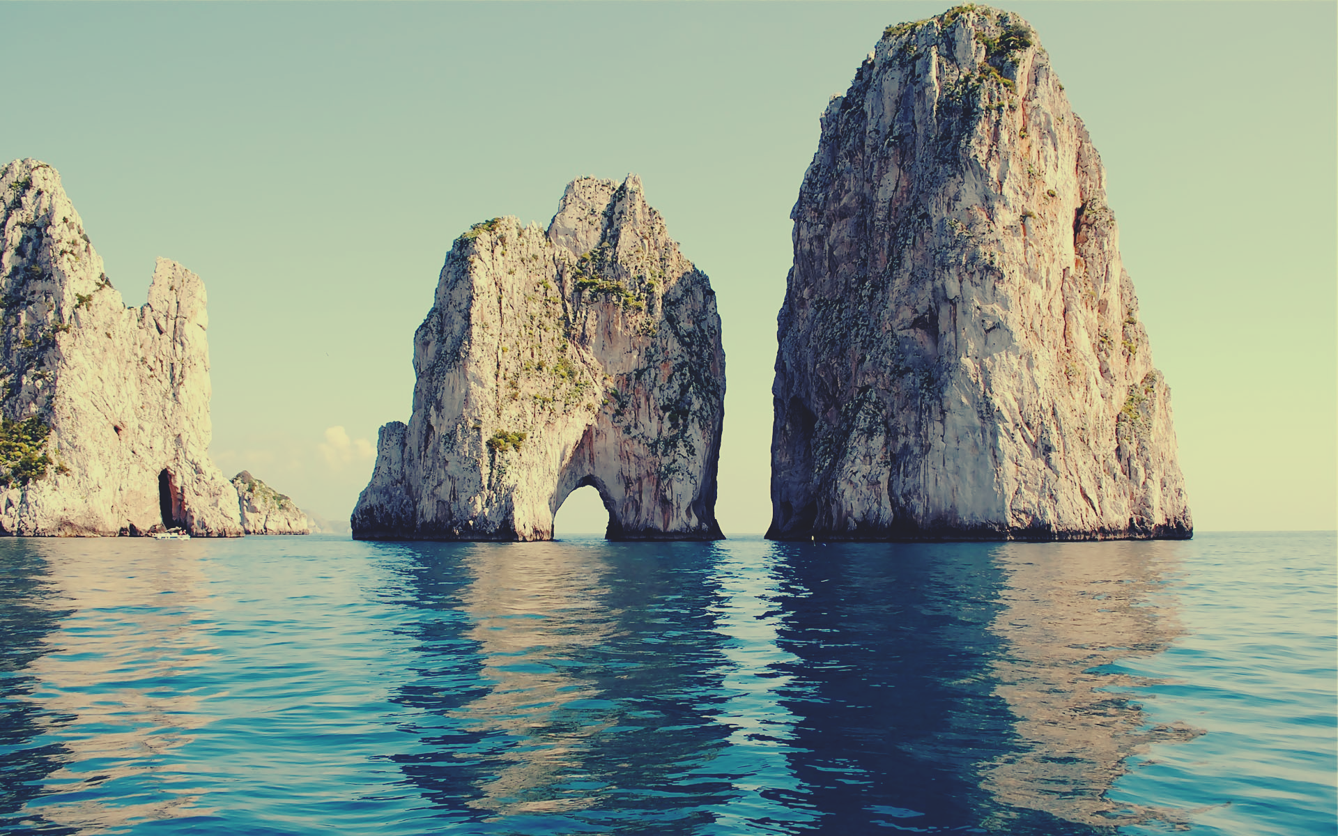 The Faraglioni rocks seen from the sea in Capri